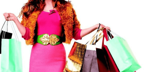 The picture shows a woman holding so many bags, showing her lack of responsibility when it comes to shopping